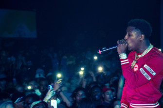 Nba Youngboy Performs Onstage In Front Of An Excited