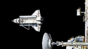 The Space Shuttle Discovery On Its Final Mission To International