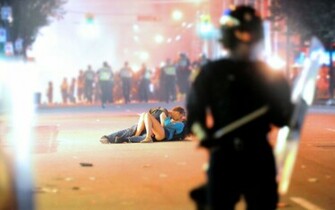 The Riot Kissing Wallpaper iPhone