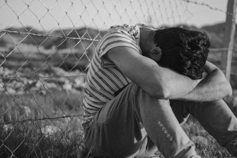 Downcast Crying Sad Boy Wallpaper
