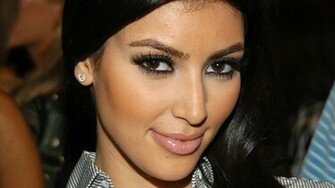Kim Kardashian Smiles Wallpaper For iPhone