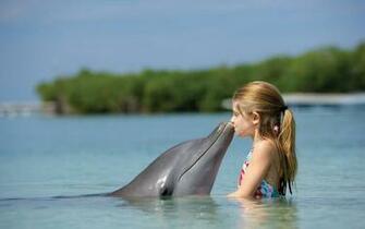 HD Dolphin Wallpaper With A Kissing Little Girl Dolphins