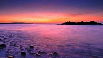 Amanecer En Playa Rocosa HD Imagenes