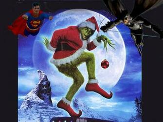 Merry Christmas Super Hero Wallpaper Featuring Superman And Batman Vs