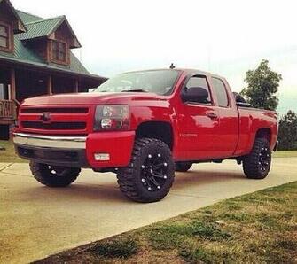 Red Lifted Chevrolet Silverado Truck