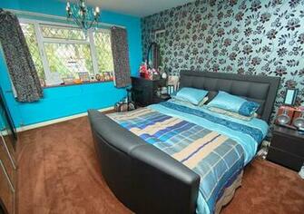 Colourful Blue Grey Bedroom With Chandelier Feature Wall Wallpaper