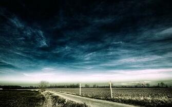 Stormy Deserted Road Desktop Wallpaper