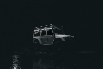 Grey Mercedes Benz G Class During Nighttime Photo