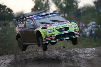 Ford Jumping Rally Racing Cars Side Wallpaper