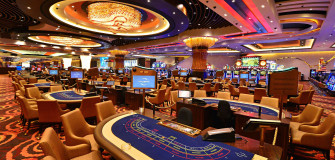 A Grand Game Unfolding At Sophisticated Poker Table Wallpaper