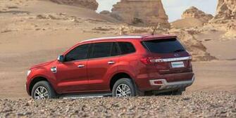 Ford Endeavour Side In Sand UHD Image And