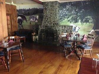 Photograph Of Their Cattle Made Into Wallpaper At The Restaurant