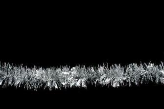 Stock Photo Christmas Tinsel On Black Imagelive