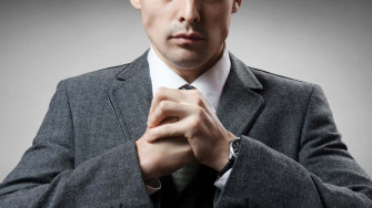 Intimidating Man In Suit Wallpaper