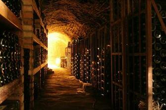 Wallpaper Cozy Wine Cellar With Long Rows Of Shelves 3072h2048