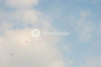Wallpaper Background Of A Red Balloons Flying In The Blue Sky With