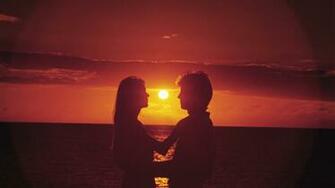 Couple Sun Man Woman Sunset Love Sea Wallpaper
