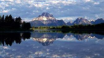 The Mirror Like River Both Image And Look Of Hill Are Shown With