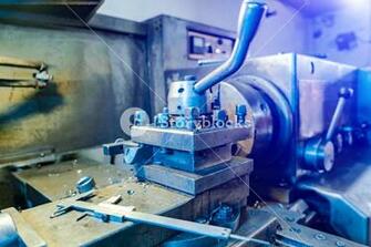 Cnc Lathe Machine In Workshop With Blue Background Hi Precision