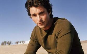 Christian Bale On The Beach Wallpaper
