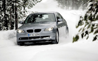 Bmw On Snow HD Wallpaper