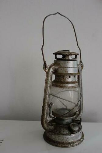 Oil Lamp By The Night Bird