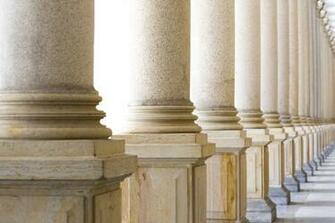 Colonnade Row Of Classical Stone Columns Background With Copy