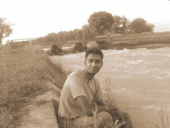 Punjabi Near Canal Wallpaper