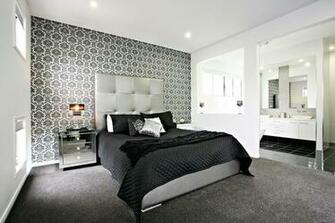 Wallpaper Feature Wall Makes A Dramatic Backdrop For The Bed