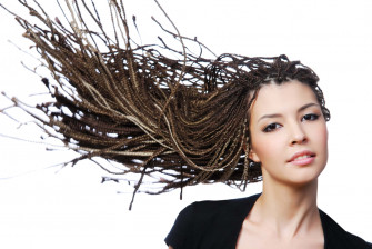 A Woman With Long Hair Blowing In The Wind Wallpaper