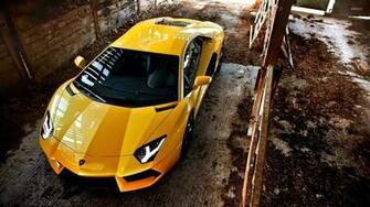 Top Of A Yellow Lamborghini Aventador Wallpaper Car