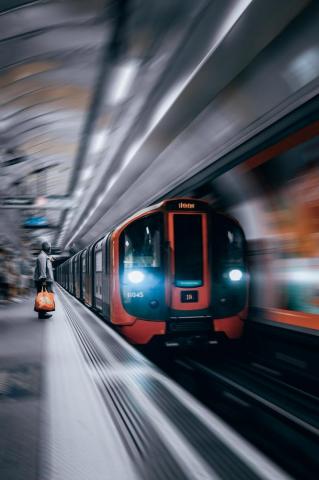 Red And Black Train In A Tunnel Photo London Image