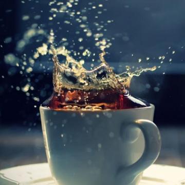Splash In A Tea Cup iPad Wallpaper
