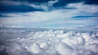 Aboe The Clouds On A Clear Day Desktop Wallpaper