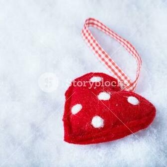 Red Toy Suave Heart On A Frosty White Snow Winter Background