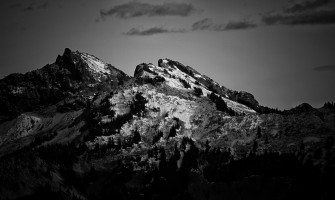 Black Mountain Surrounded With Cloudy Sky Wallpaper