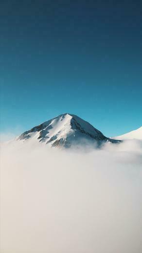 Minimalist Mountain Above Clouds iPhone Wallpaper