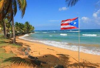 La Bandera De Puerto Rico En Playa Borincana Fotos