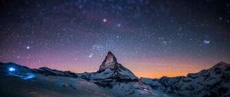 HD Mountains Night Sky Blurred Stars Light Show Wallpaper