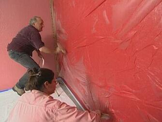 Manipulate Plastic Sheeting With Wallpaper Brush