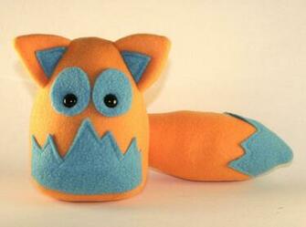 Orange And Teal Fox Plushie By Saint Angel