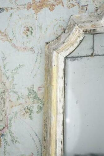 Faded Wallpaper And Antique Mirror Inside