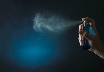 Fragrance Spray Blue Background Commercial PhotoHDx