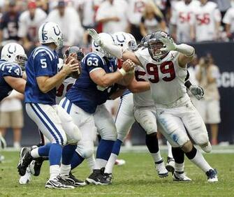 Prepares To Pass As Defensive End J Watt Of The Houston Texans