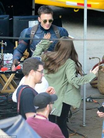 Elizabeth Olsen And Chris Evans On The Set Of Captain America