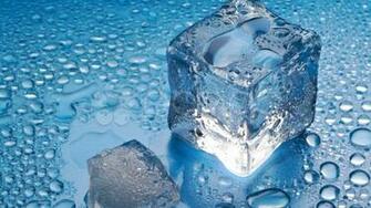 Melting Ice Cube On Blue Background Stock Video