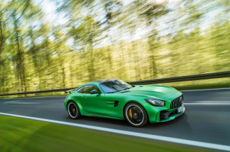 Fast Mercedes Amg Gt R With Green Trees Background Wallpaper