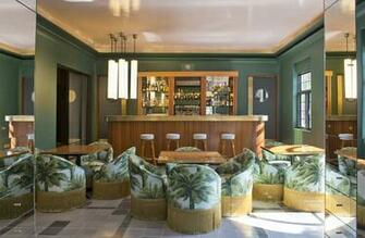 Above Club Chairs Upholstered In Pierre Frey Fabric At Casa Fayette