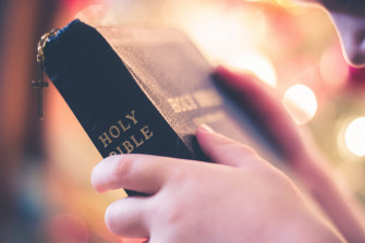 Wallpaper Id A Person Holding The Holy Bible