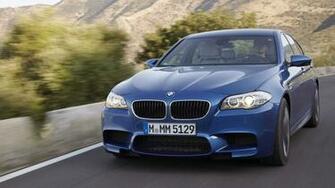 Blue Bmw M5 Amazing Car Running On A Road While Racing